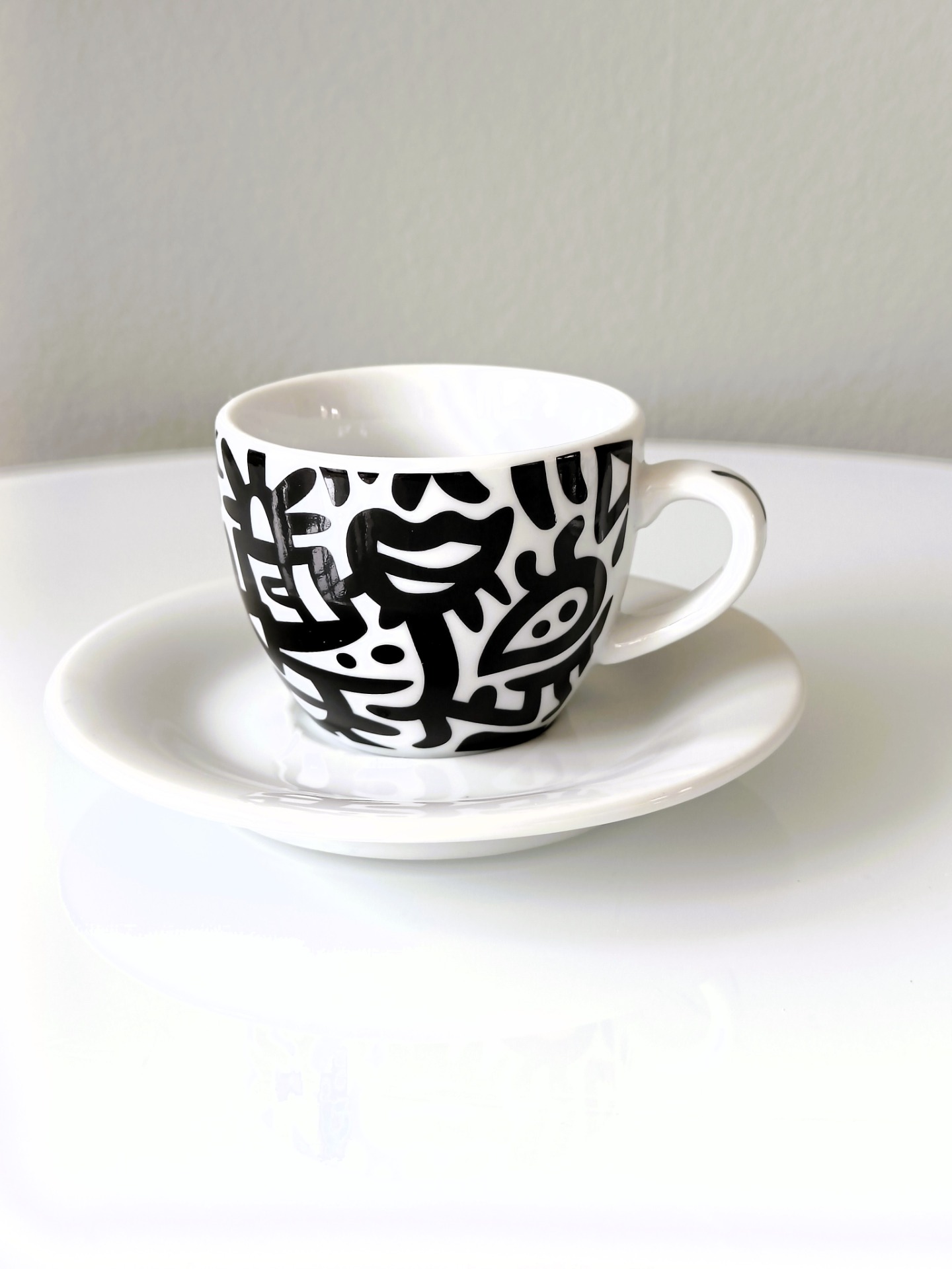 Espressokopje met schotel 'Keith Haring'